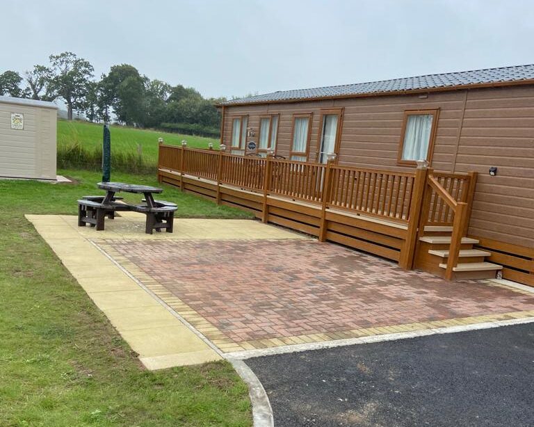 patio area and tarmac drive